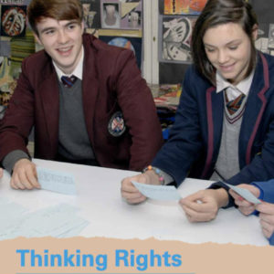 Cover of Unicef UK Thinking Rights Resource showing two teenagers - a boy and a girl - in a school lesson.
